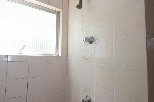 Banheiro de kitnet/studio à venda com 1 quarto, 43m² em Centro, São Leopoldo
