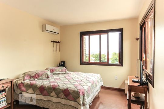 Suíte de casa de condomínio à venda com 3 quartos, 195m² em Cristal, Porto Alegre