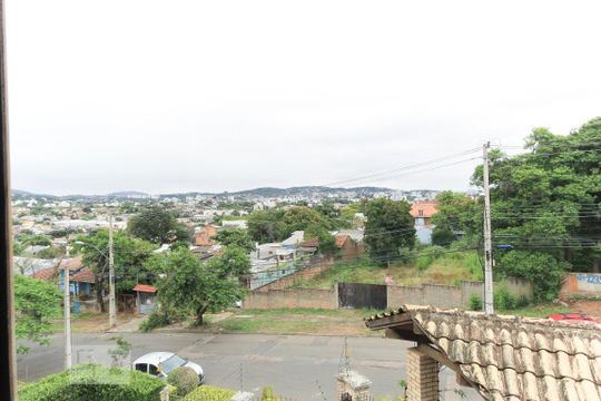 Vista da suíte de casa de condomínio à venda com 3 quartos, 195m² em Cristal, Porto Alegre