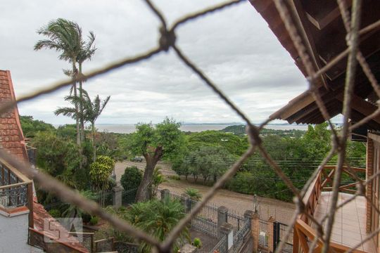 Vista da Suíte de casa de condomínio à venda com 3 quartos, 278m² em Ipanema, Porto Alegre
