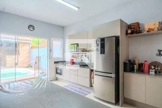 Cozinha de casa de condomínio à venda com 2 quartos, 160m² em Vila Nova, Porto Alegre