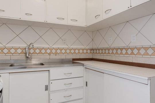 Cozinha de apartamento à venda com 3 quartos, 108m² em Rio Branco, Porto Alegre