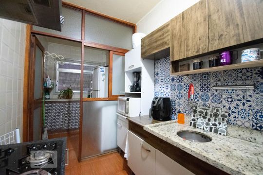 Cozinha de apartamento à venda com 1 quarto, 84m² em Teresópolis, Porto Alegre