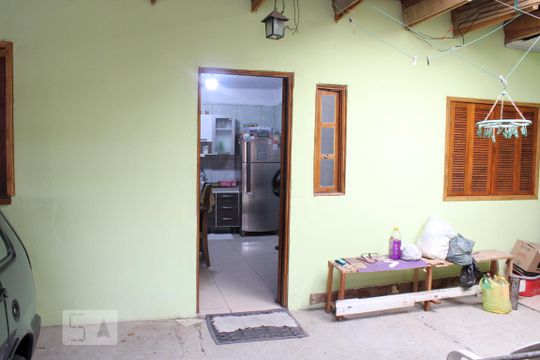 Fachada de casa à venda com 3 quartos, 80m² em Guajuviras, Canoas