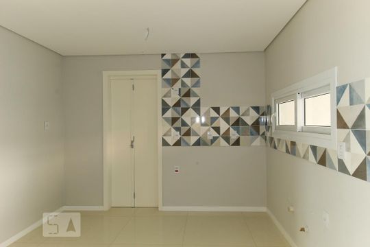 Cozinha de casa de condomínio à venda com 3 quartos, 140m² em Campo Novo, Porto Alegre