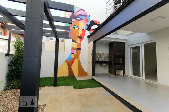 Quintal de casa de condomínio à venda com 3 quartos, 140m² em Campo Novo, Porto Alegre