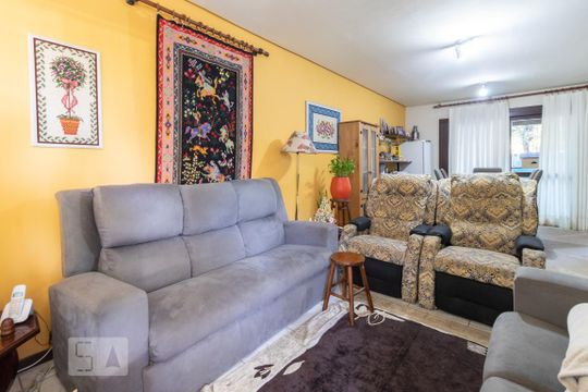Sala de casa de condomínio à venda com 3 quartos, 153m² em Ipanema, Porto Alegre