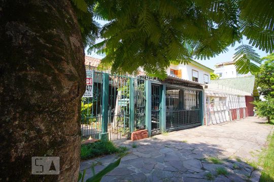 Fachada da casa de casa à venda com 4 quartos, 250m² em Jardim Lindóia, Porto Alegre