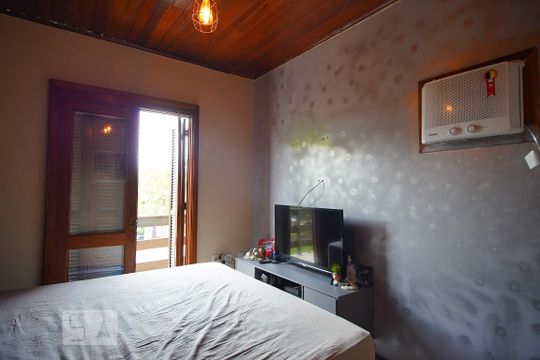 Quarto 1 de casa de condomínio à venda com 3 quartos, 159m² em Protásio Alves, Porto Alegre