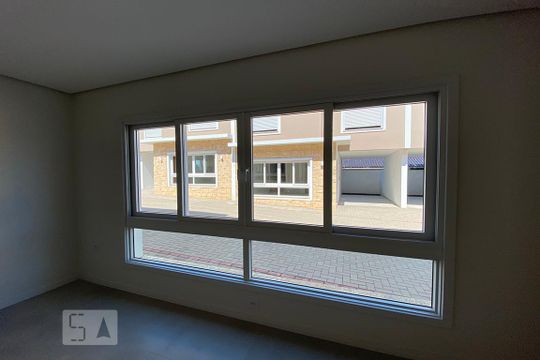 Janela da Sala de casa de condomínio à venda com 3 quartos, 108m² em Pátria Nova, Novo Hamburgo