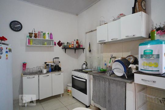 Cozinha de casa de condomínio à venda com 3 quartos, 180m² em Navegantes, Porto Alegre