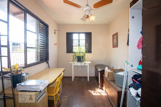 Quarto 1 de casa à venda com 3 quartos, 363m² em Rio Branco, Porto Alegre