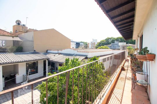 Varanda de casa à venda com 3 quartos, 363m² em Rio Branco, Porto Alegre