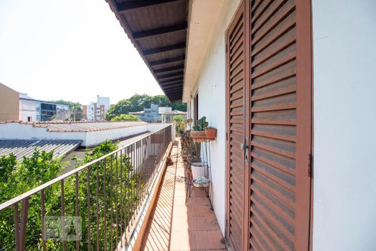 Varanda de casa à venda com 3 quartos, 363m² em Rio Branco, Porto Alegre