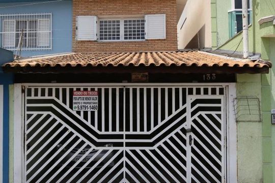 Fachada de casa à venda com 3 quartos, 193m² em Vila America, Santo André