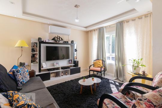 Sala de casa de condomínio à venda com 3 quartos, 185m² em Aberta dos Morros, Porto Alegre