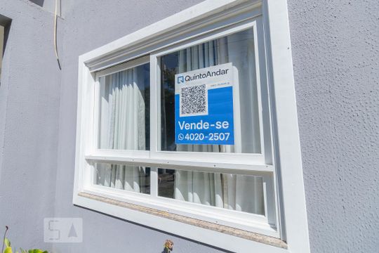 Fachada de casa de condomínio à venda com 3 quartos, 185m² em Aberta dos Morros, Porto Alegre