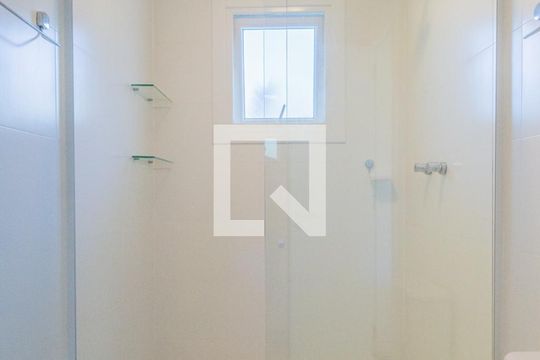 Banheiro do Quarto 1 e 2 de casa de condomínio à venda com 3 quartos, 250m² em Vila Nova, Porto Alegre