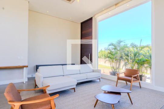 Sala de casa de condomínio à venda com 3 quartos, 250m² em Vila Nova, Porto Alegre