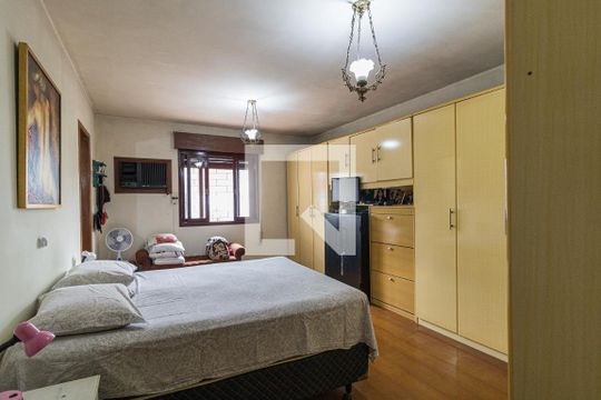 Quarto 1 suite de casa à venda com 3 quartos, 265m² em Vila Ipiranga, Porto Alegre