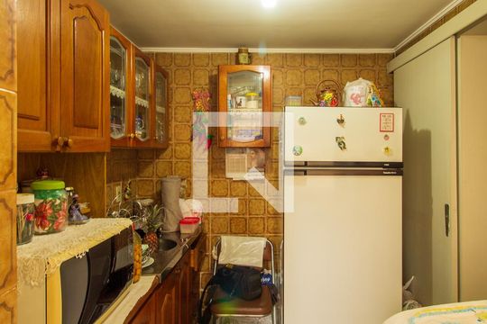 Cozinha e Área de Serviço de apartamento à venda com 2 quartos, 61m² em Medianeira, Porto Alegre