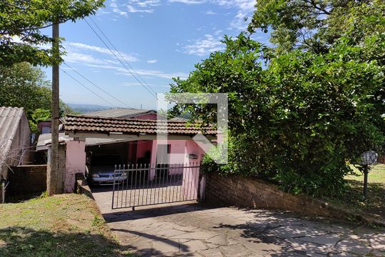 Fachada de casa à venda com 2 quartos, 120m² em Rondônia, Novo Hamburgo