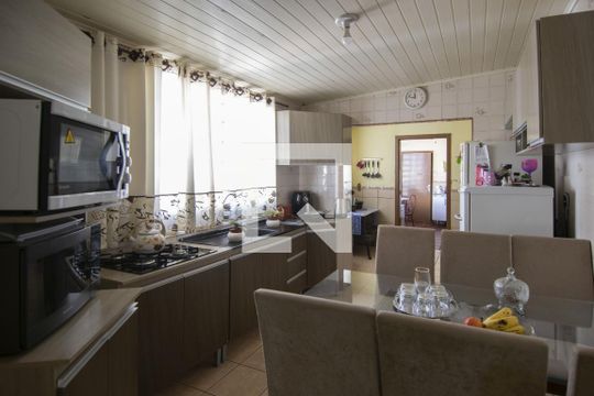 Cozinha de casa de condomínio à venda com 4 quartos, 251m² em Rubem Berta, Porto Alegre