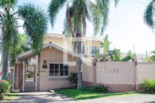 Fachada de casa à venda com 4 quartos, 95m² em Harmonia, Canoas