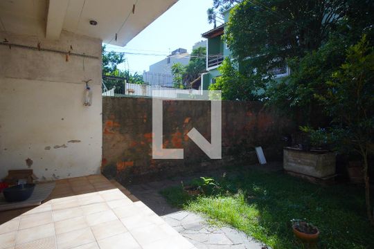 Varanda Sala- Fundo de casa à venda com 3 quartos, 260m² em Cristo Redentor, Porto Alegre