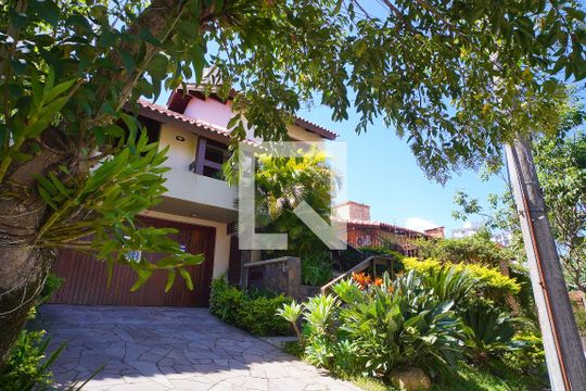Fachada da Casa de casa à venda com 3 quartos, 390m² em Boa Vista, Porto Alegre