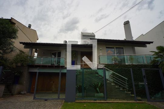 Fachada da Casa de casa à venda com 3 quartos, 352m² em Chácara das Pedras, Porto Alegre