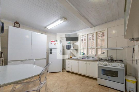 Cozinha de casa à venda com 4 quartos, 243m² em Campo Novo, Porto Alegre