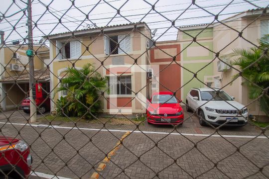 Vista da Sala de casa de condomínio à venda com 4 quartos, 90m² em Humaitá, Porto Alegre