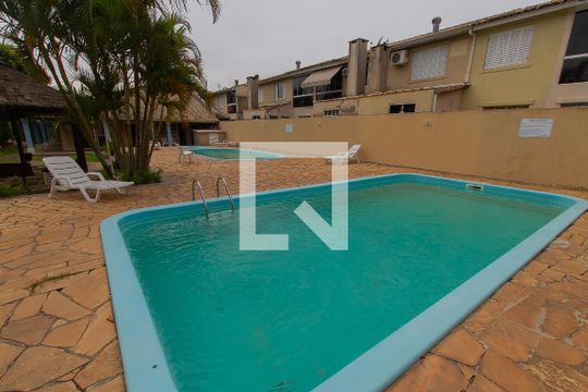 Área comum - Piscina de casa de condomínio à venda com 4 quartos, 90m² em Humaitá, Porto Alegre