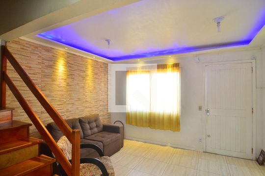 Sala de casa de condomínio à venda com 3 quartos, 89m² em Rio Branco, Canoas