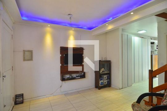 Sala de casa de condomínio à venda com 3 quartos, 89m² em Rio Branco, Canoas