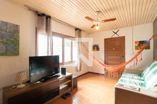 Sala de casa à venda com 3 quartos, 240m² em Vila Nova, Porto Alegre