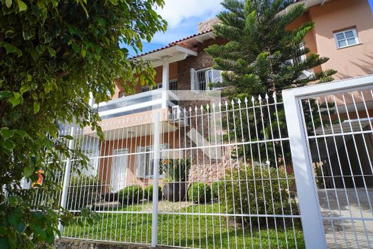 Fachada da Casa de casa à venda com 3 quartos, 480m² em Jardim Itu Sabará, Porto Alegre