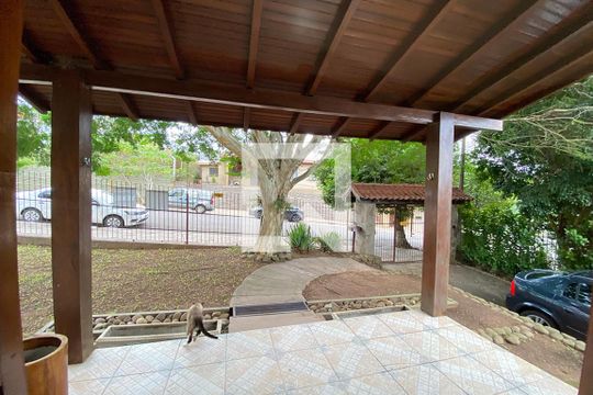 Vista da Porta Janela da Sala de casa à venda com 3 quartos, 180m² em Rincão, Novo Hamburgo
