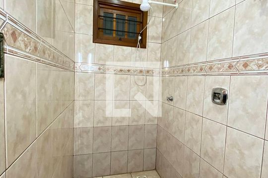 Banheiro da Suíte 1 de casa à venda com 4 quartos, 411m² em São José, Novo Hamburgo