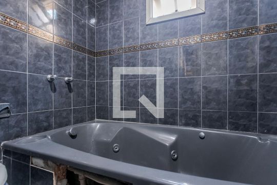 Banheiro de casa à venda com 5 quartos, 304m² em Cristo Redentor, Porto Alegre