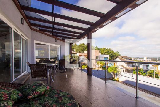 Varanda de casa de condomínio à venda com 3 quartos, 250m² em Hípica, Porto Alegre