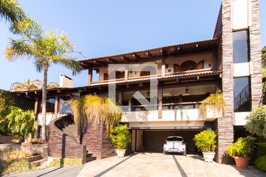 Fachada de casa à venda com 4 quartos, 430m² em Vila Assunção, Porto Alegre
