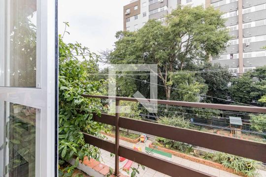 Varanda de casa de condomínio à venda com 3 quartos, 220m² em Santo Antônio, Porto Alegre