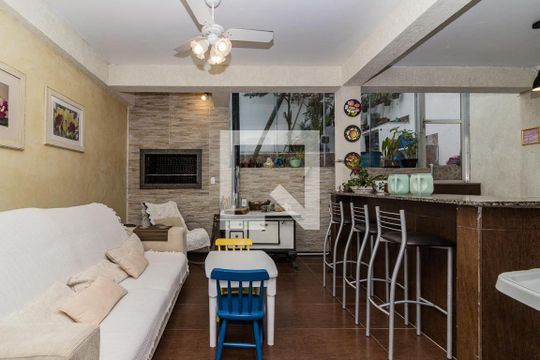 Sala de casa de condomínio à venda com 3 quartos, 220m² em Santo Antônio, Porto Alegre
