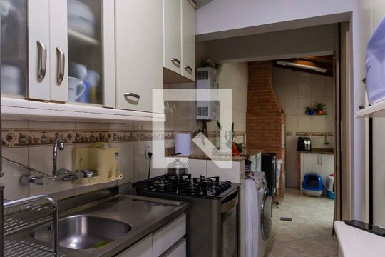 Cozinha  de casa de condomínio à venda com 3 quartos, 100m² em Humaitá, Porto Alegre