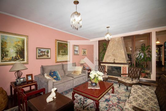 Sala de Estar de casa à venda com 3 quartos, 100m² em Vila Ipiranga, Porto Alegre