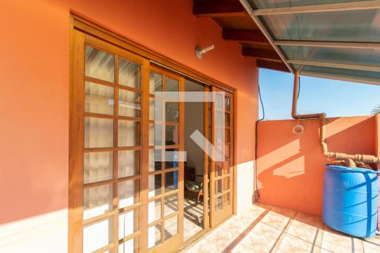 Varanda de casa de condomínio à venda com 5 quartos, 340m² em Espírito Santo, Porto Alegre