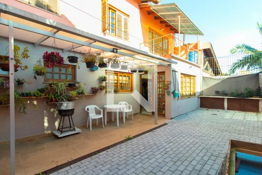 Quintal de casa de condomínio à venda com 5 quartos, 340m² em Espírito Santo, Porto Alegre