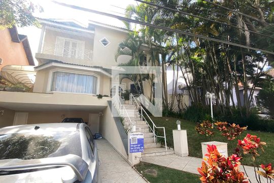 Fachada de casa de condomínio à venda com 4 quartos, 420m² em Alphaville, Santana de Parnaíba